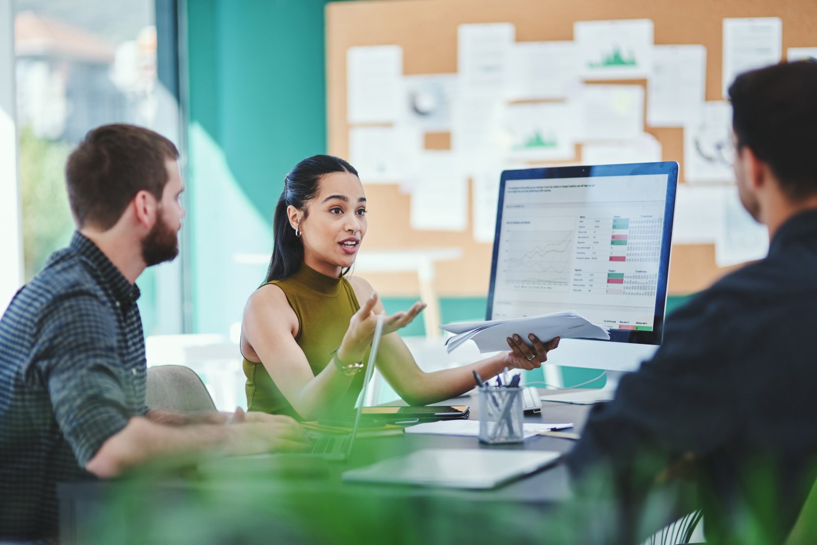 Business team reviewing performance data in a meeting